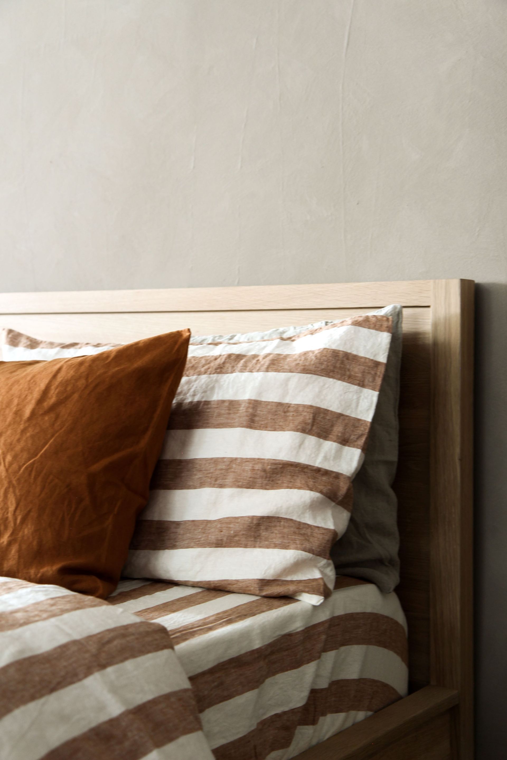 Headboard with Striped Sheets
